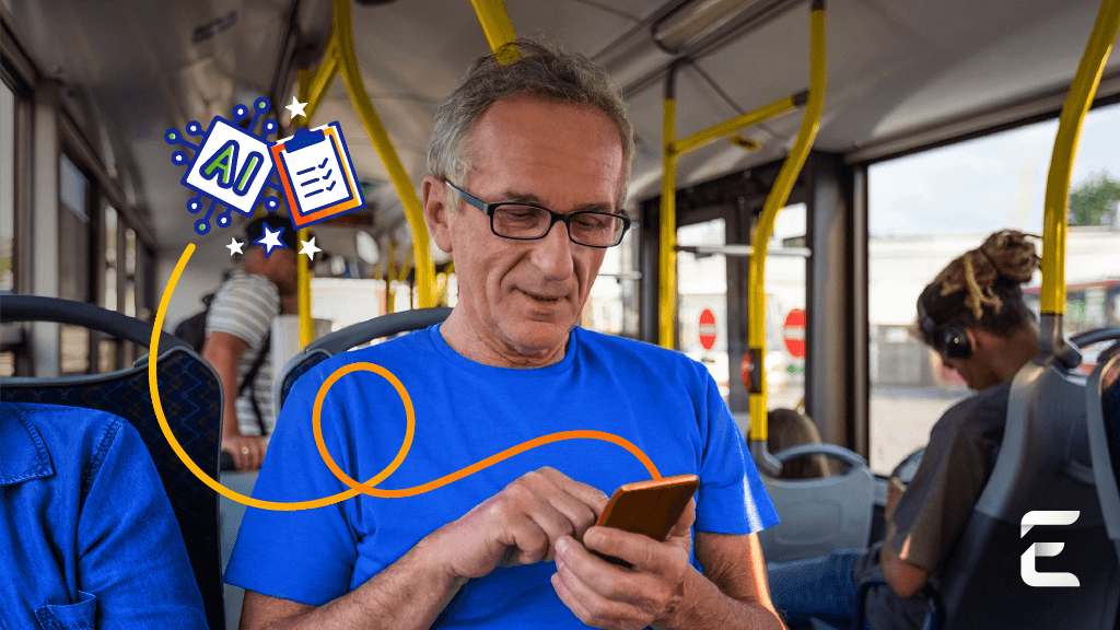 Man wearing glasses looking at phone screen